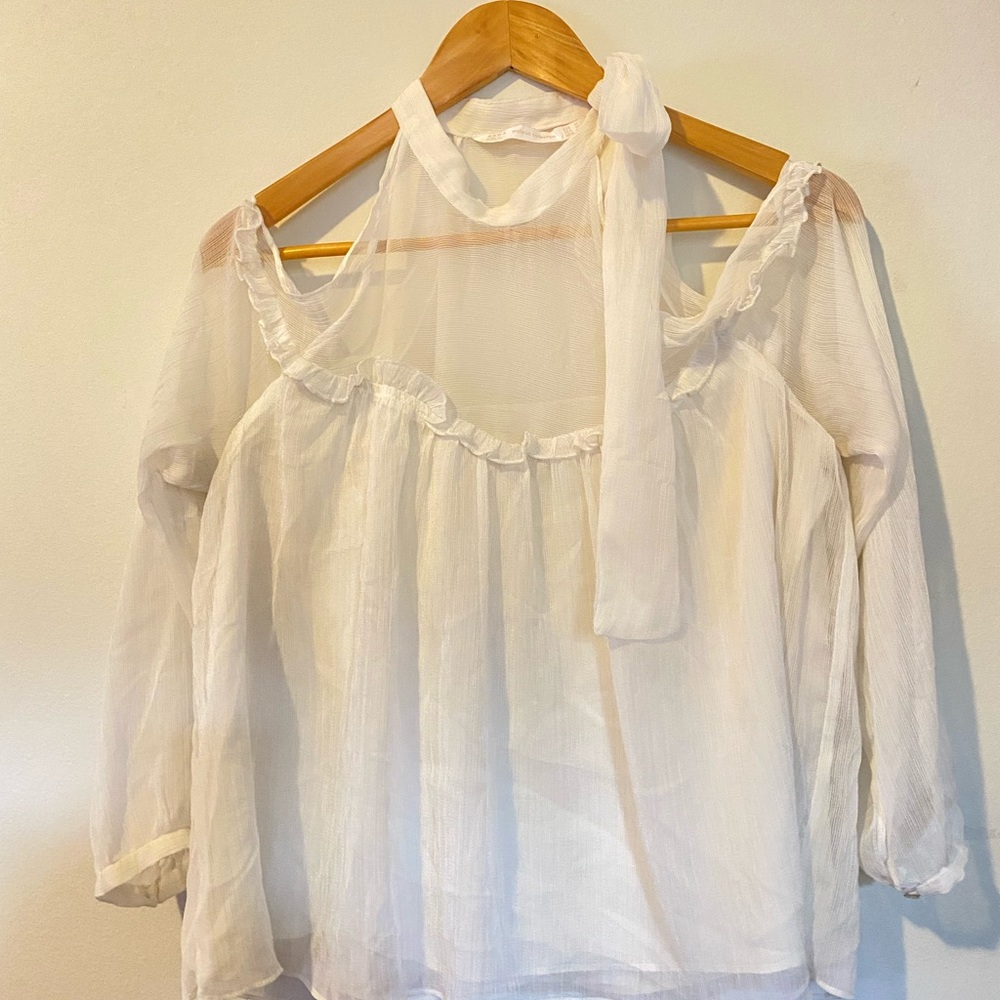 White sheer see-through blouse